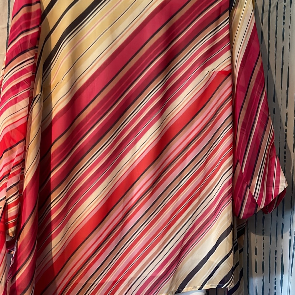 Blouse large with diagonal strips multi color.